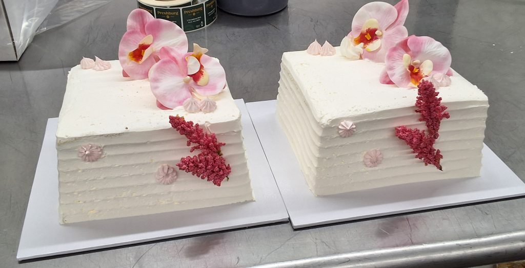 Preshburg square cakes finished with pink orchids